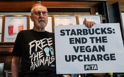 Actor James Cromwell joins PETA in Starbucks dairy protest